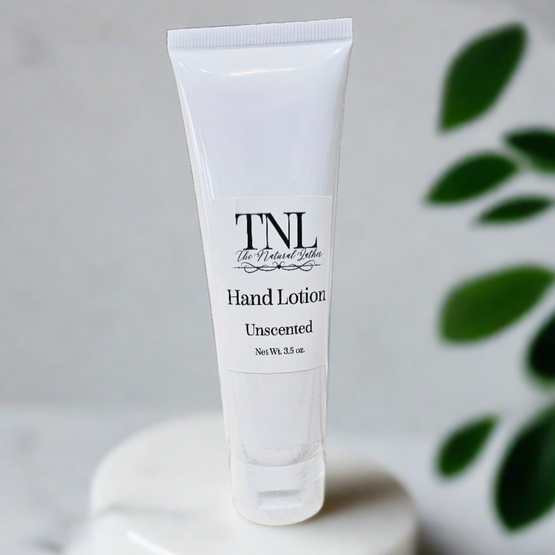 A tube of Moisturizing hand and body Lotion by The Natural Lather